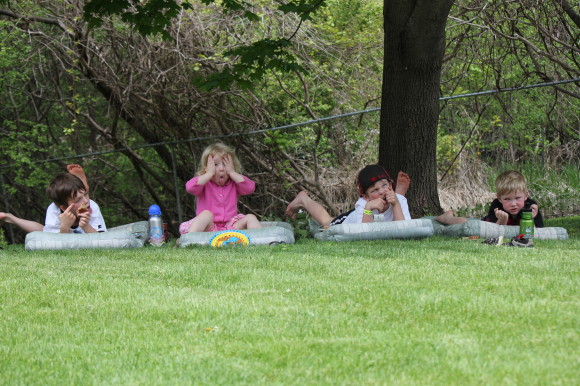 An impromptu picnic in the backyard. My smalls pulling funny faces and just